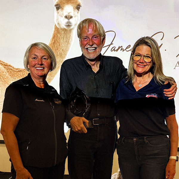 Mike Safley accepting the James G. King award with Amanda VandenBosch and Robin Gifford